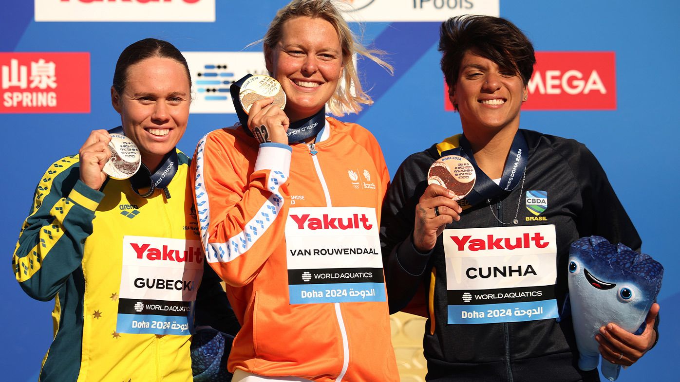 Australia&#x27;s Chelsea Gubecka (left) clinched silver at the World Aquatics Championships in Doha.