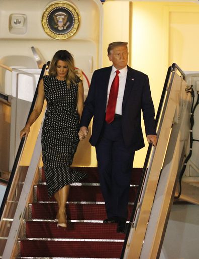 WEST PALM BEACH, FLORIDA - DECEMBER 23: U.S. President Donald Trump and First Lady Melania Trump exit from Air Force One at the Palm Beach International Airport on December 23, 2020 in West Palm Beach, Florida. President Trump is scheduled to enjoy a 10-day holiday visit at his Mar-a-Lago resort during the last Christmas of his precedency. (Photo by Joe Raedle/Getty Images)