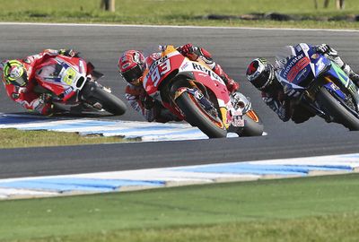 Jorge Lorenzo (R) and Andrea Iannone (L) finished second and third.