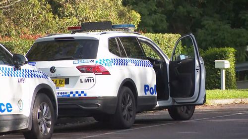 Police car outside home in Lake Macquarie after shots allegedly fired