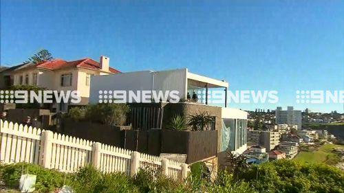 AFP, NSW Police and the Joint Organised Crime Group swoop on John Ibrahim's Dover Heights home.