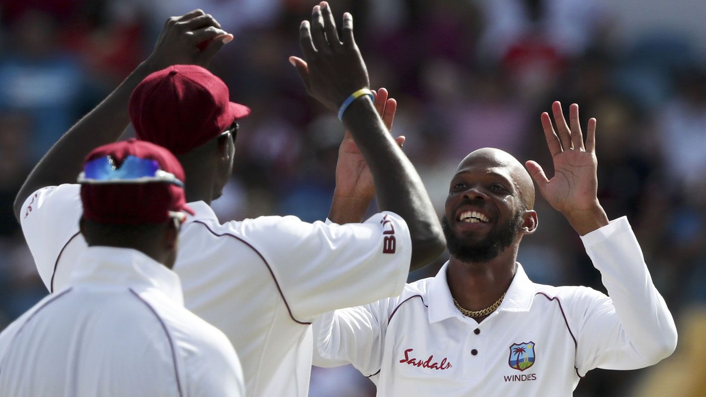 Part-time off-spinner Roston Chase takes eight wickets as West Indies crush England in first Test