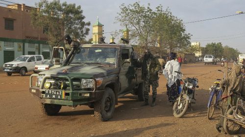 Seven dead after gunmen storm Mali hotel taking hostages