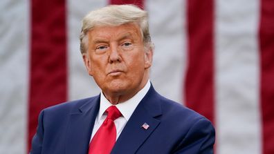 President Donald Trump listens during an event on Operation Warp Speed in the Rose Garden of the White House in Washington