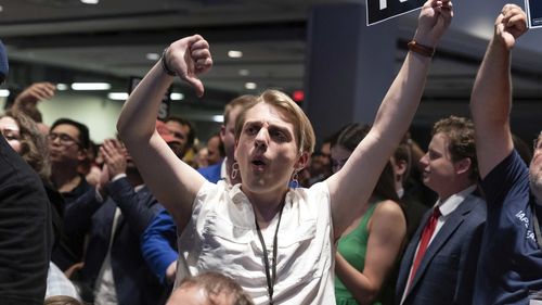 Libertarian delegates jeer Republican presidential candidate former President Donald Trump as he speaks at the Libertarian National Convention.