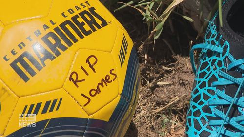 Tributes left at the scene of fatal Central Coast crash.