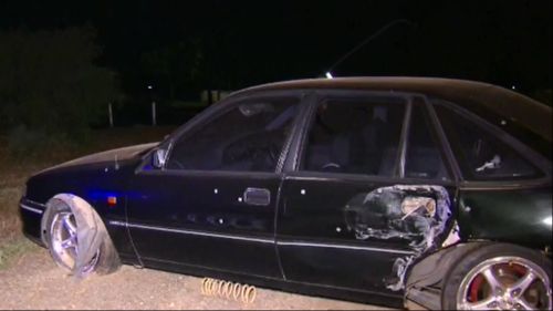 Driver wanted after smashing car into light pole following police pursuit in Adelaide
