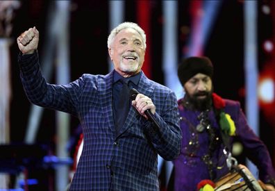 Sir Tom Jones performs at the Royal Albert Hall in London for a star-studded concert to celebrate the Queen's 92nd birthday.