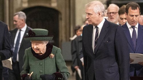 Britain's Queen Elizabeth II and Prince Andrew, center right, arrive for a Service of Thanksgiving for the life of Prince Philip, Duke of Edinburgh, at Westminster Abbey in London, Tuesday, March 29, 2022. (Richard Pohle/Pool via AP)