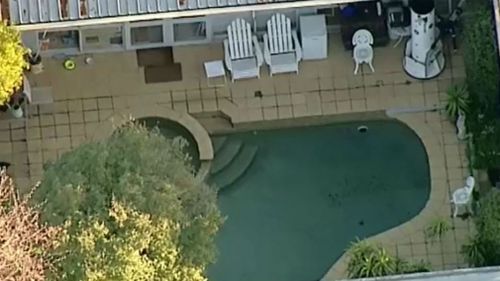 The man and woman were found in the upmarket suburb of Kew. (9NEWS)