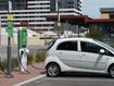 Can a non-electric vehicle park next to a charging station?