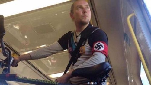Photo of Port Adelaide fan wearing swastika armband sparks outcry