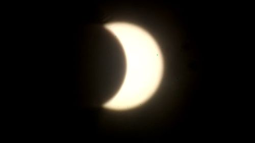 Otherworldly partial eclipse dominates Darwin skies