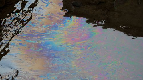 A chemical sheen on the surface of Sulphur Run downstream from the derailment site in East Palestine, OH on Monday, February 20, 2023. Cleanup continues in the small town of East Palestine in northeastern Ohio, the site of a train derailment that occurred on February 4, 2023.