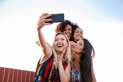 Group of girlfriends taking a photo