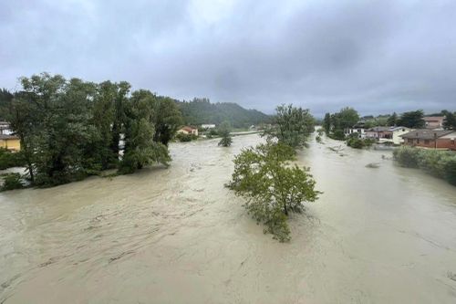 A view of an overflowing Savio river in Cesena, central Italy, Wednesday, May 17, 2023. 