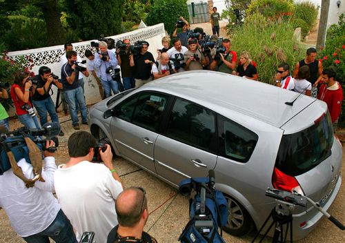 Media surround the McCann family car as it leaves the apartment in Praia da Luz with the twins September 8, 2007 in the Algarve, Portugal.