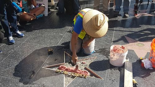 Repair work has begun on Donald Trump's star after it was destroy by an axe-wielding vandal. (9NEWS)