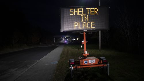 A sign signals the public to shelter in place during an active shooter situation on Wednesday, Oct. 25, 2023, in Lewiston, Maine 