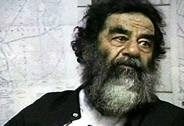 Saddam Hussein was captured in a spider hole near which town?