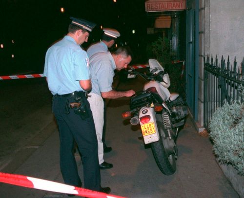 Police seize the motorbike of a photographer who was chasing the car of Diana, Princess of Wales, when it crashed in a tunnel along the Seine river