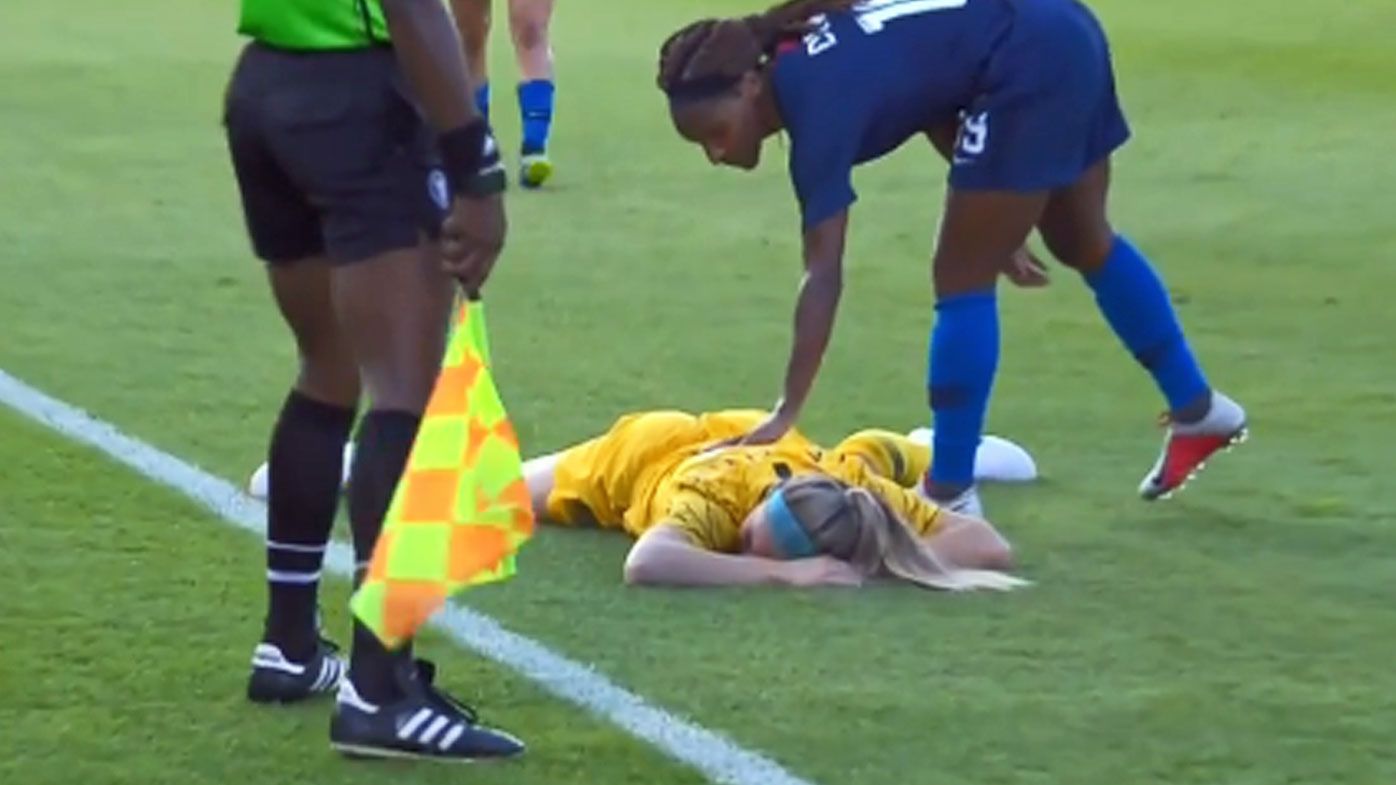 Matildas defender Ellie Carpenter flattened by 'absolutely vicious clearance'