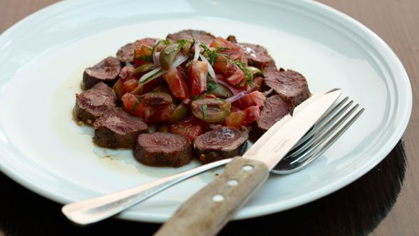 Harissa-rubbed kangaroo loin with blood orange, olive, Spanish onion and mint salad