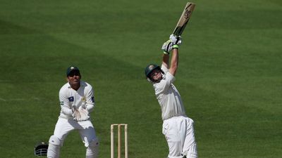 Smith's maiden fifty comes at No.8