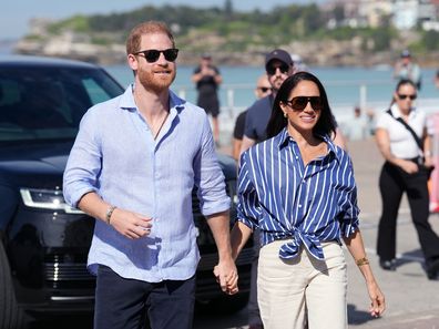 SYDNEY, AUSTRALIA - APRIL 17: Prince Harry, Duke of Sussex and Meghan, Duchess of Sussex arrive to meet volunteer first responders from Bondi Surf Bathers' Life Saving Club, during a visit to Bondi Beach, on day four of the royal trip to Australia on April 17, 2026 in Sydney, Australia. Volunteers from the organisation, founded in 1907, played an integral role in protecting beachgoers and saving lives during the terrorist attack at Bondi Beach on December 14. 