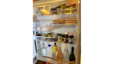 Toni's fridge door is the place where mustard goes to hide.