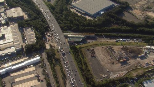 Long lines of traffic on eastbound lanes of M4 in Sydney after multi-vehicle crash. 