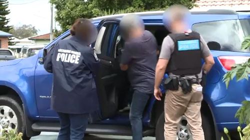 Four people were arrested in the raids today.