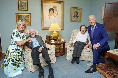 Former President Jimmy Carter and former first lady Rosalynn Carter pose for a photo with President Joe Biden and first lady Jill Biden
