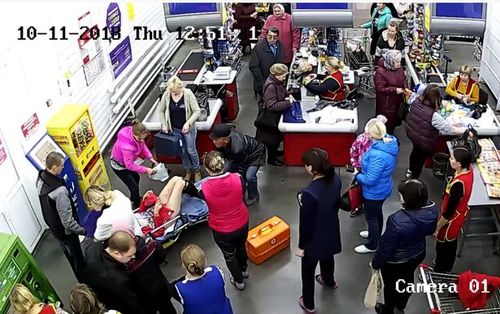 Customers continued shopping as the woman gave birth to a boy.