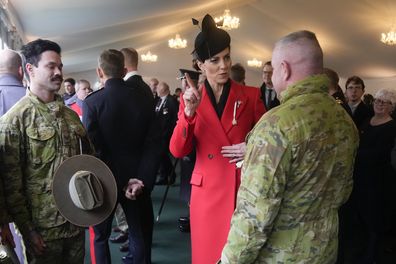 Kate, Princess of Wales talks to troops from the 5th Royal Australian Regiment (5RAR) after a St David's Day parade with members of the 1st Battalion, The Welsh Guards in Windsor England, Wednesday, March 1, 2023.