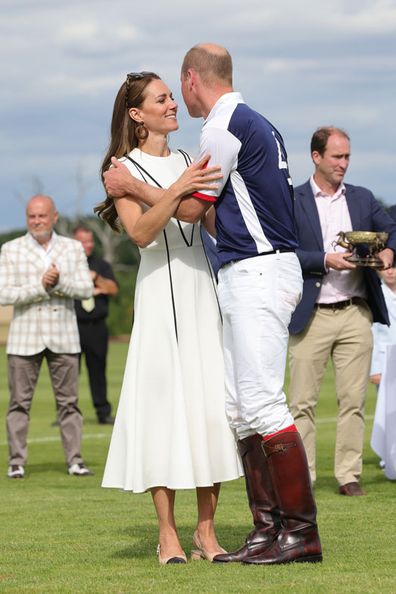 Prince William, Duke of Cambridge and Catherine, Duchess of Cambridge embrace after the Royal Charity Polo Cup 2022 at Guards Polo Club  during the Outsourcing Inc. Royal Polo Cup at Guards Polo Club, Flemish Farm on July 06, 2022 in Windsor, England. 