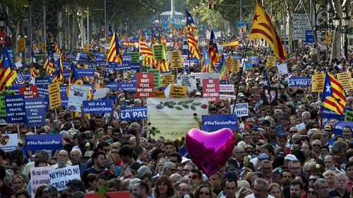 Spain's King Felipe and Prime Minister Mariano Rajoy both attended the march. (AAP)