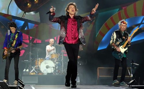 Mick Jagger flanked by guitarists Ronnie Wood and Keith Richards. (AAP)