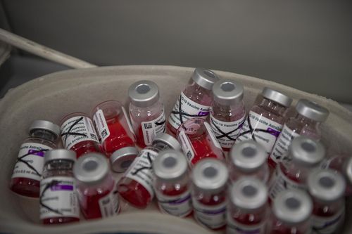 Empty vials of the AstraZeneca COVID-19 vaccine are seen at the vaccination unit of the Italian Defence, as part of COVID-19 vaccinations plan for the military personnel, in Rome, Italy. 