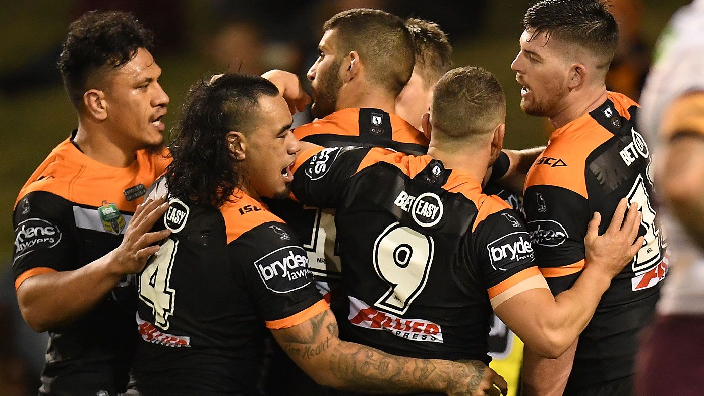 Wests Tigers hold on for crucial win against fast-finishing Manly Sea Eagles