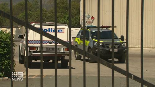 Police at the scene of a workplace accident in Beaudesert.