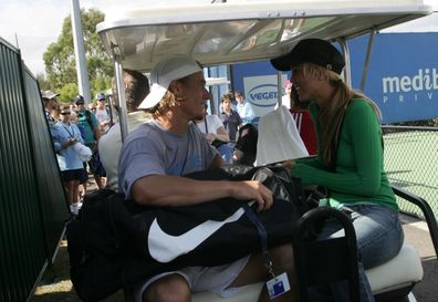 Lleyton Hewitt and Bec Hewitt (then dating) during practice at the Medibank International at Olympic Park at the Australian Open 2005.