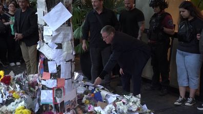 Liam Payne's father Geoff Payne greets mourning fans at memorial outside of Buenos Aires' Casa Sur hotel