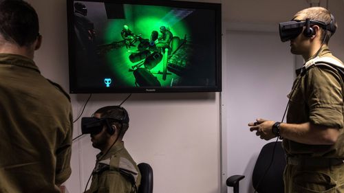 	Israeli special combat soldiers conduct a training exercise using virtual reality battlefield technology to simulate Hamas tunnels leading from Gaza to Israel at an Israeli Army base in Petach Tikva in April 2017.
