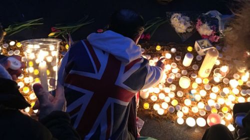 Hundreds flocked to candlelight vigil at Trafalgar Square this morning. (Henri Paget/9NEWS)