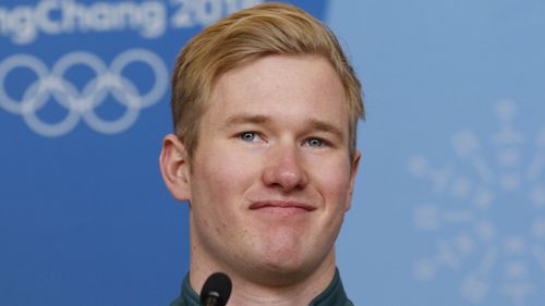 Hughes at a press conference where he was announced as flagbearer (AAP)