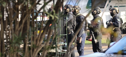 A man has been shot by police during a seige at a carvan park in Sydney's south-west.