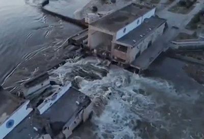 Water flowing through damaged Kherson power plant dam (Getty)