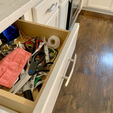 Messy Junk Drawer In Kitchen
