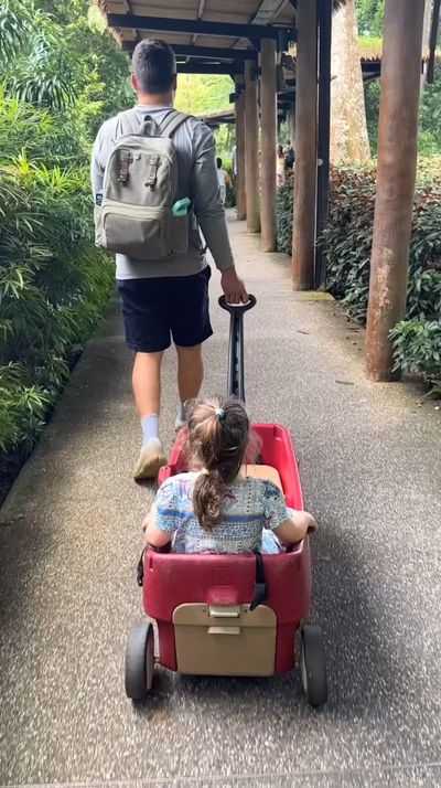 Chandler Powell with daughter Grace Warrior in Singapore